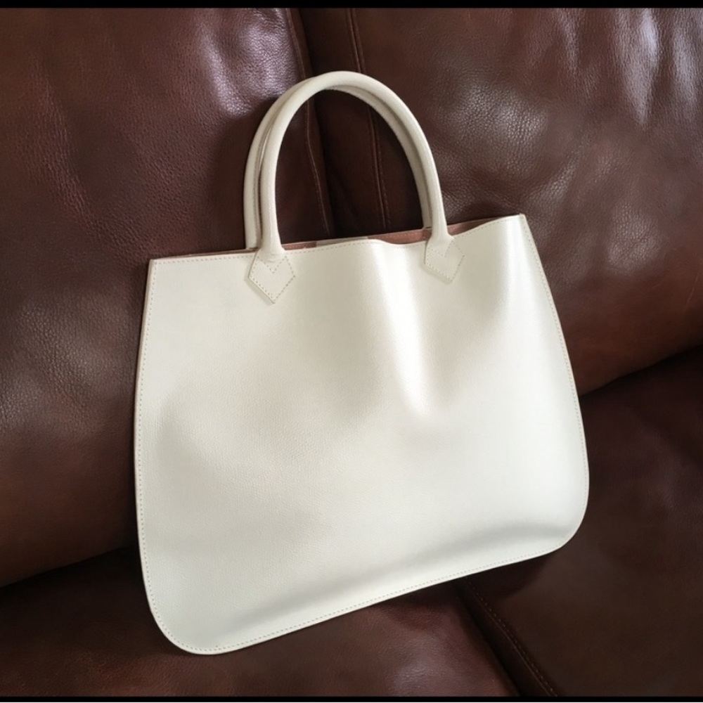 This bag measures 15 3/4” wide x 11” high